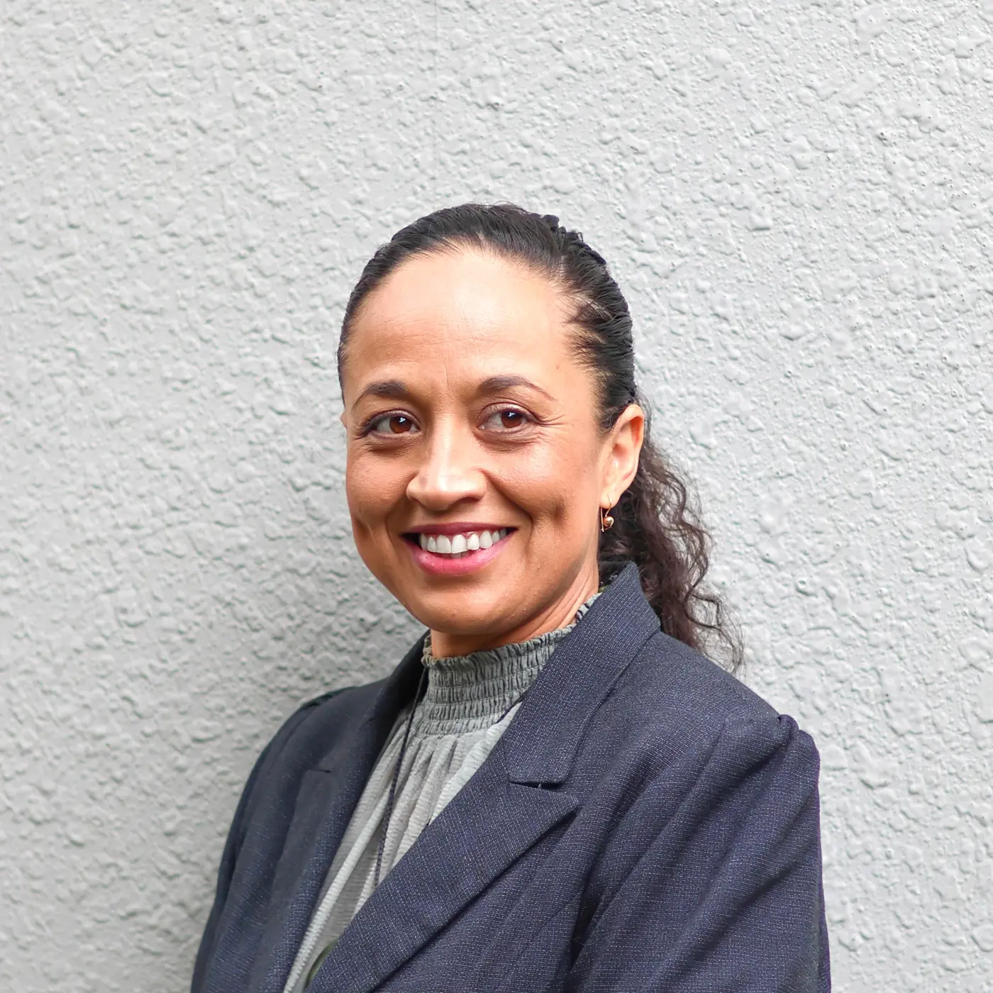 a woman smiling at camera