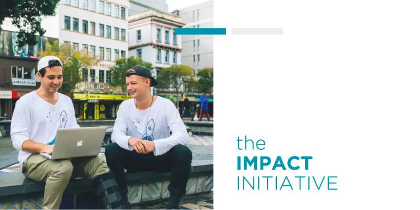 a man sitting on a ledge