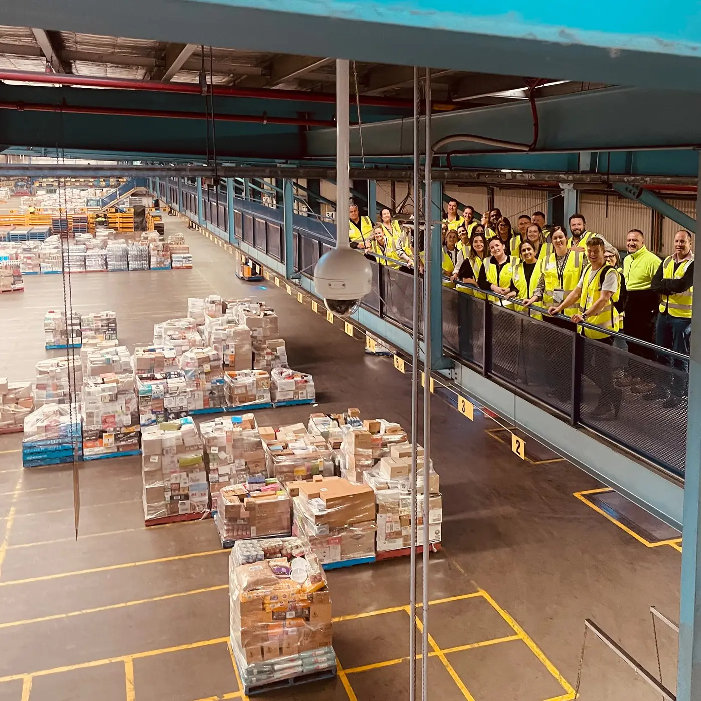 a group of people in a warehouse