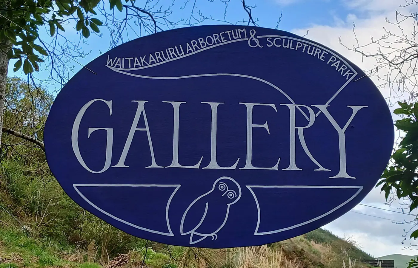 a blue sign with white text