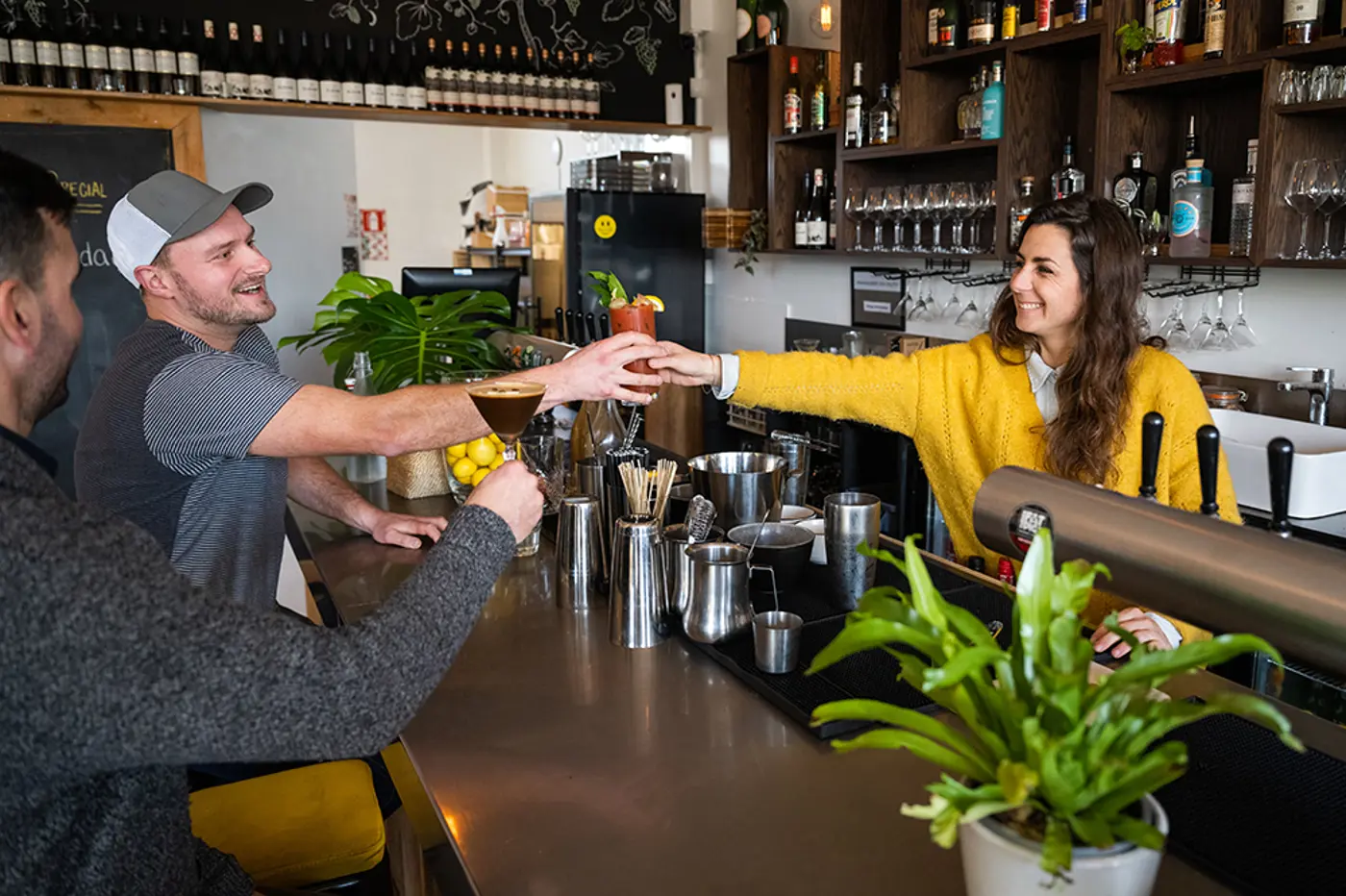 a man and woman at a bar
