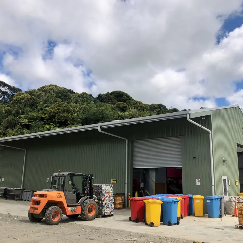 a building with a tractor parked outside