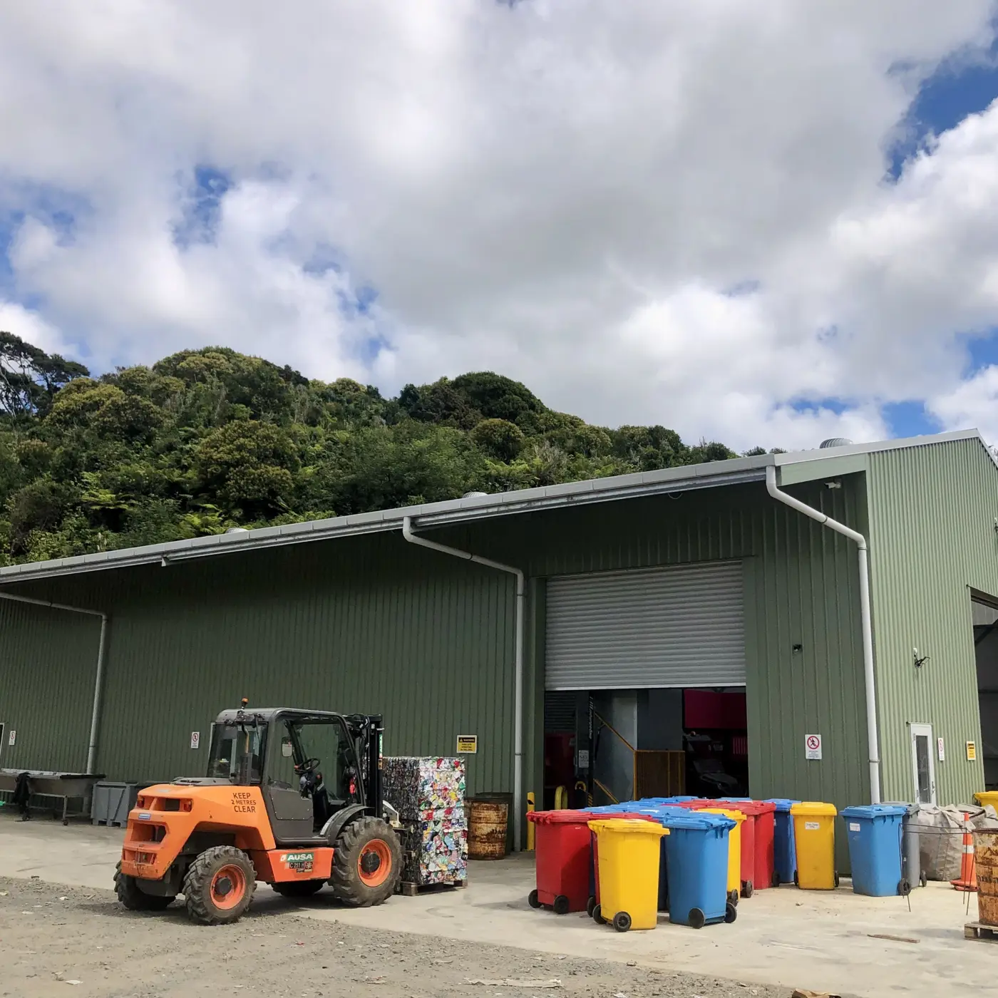 a building with a tractor parked outside
