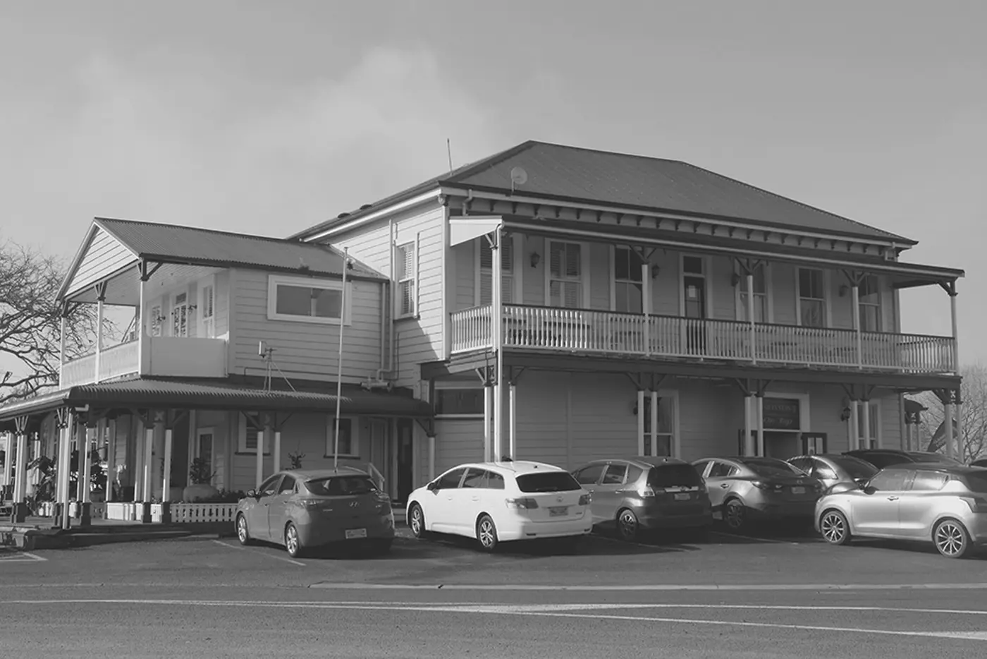a building with cars parked in front of it