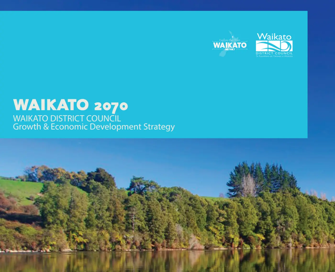 a lake with trees and a blue background