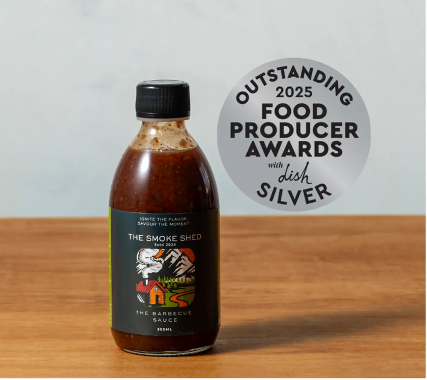 a bottle of sauce on a table