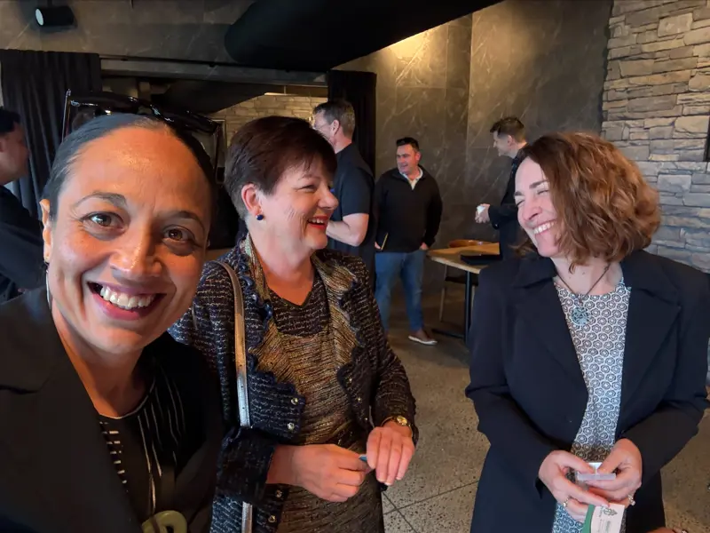 a group of women smiling