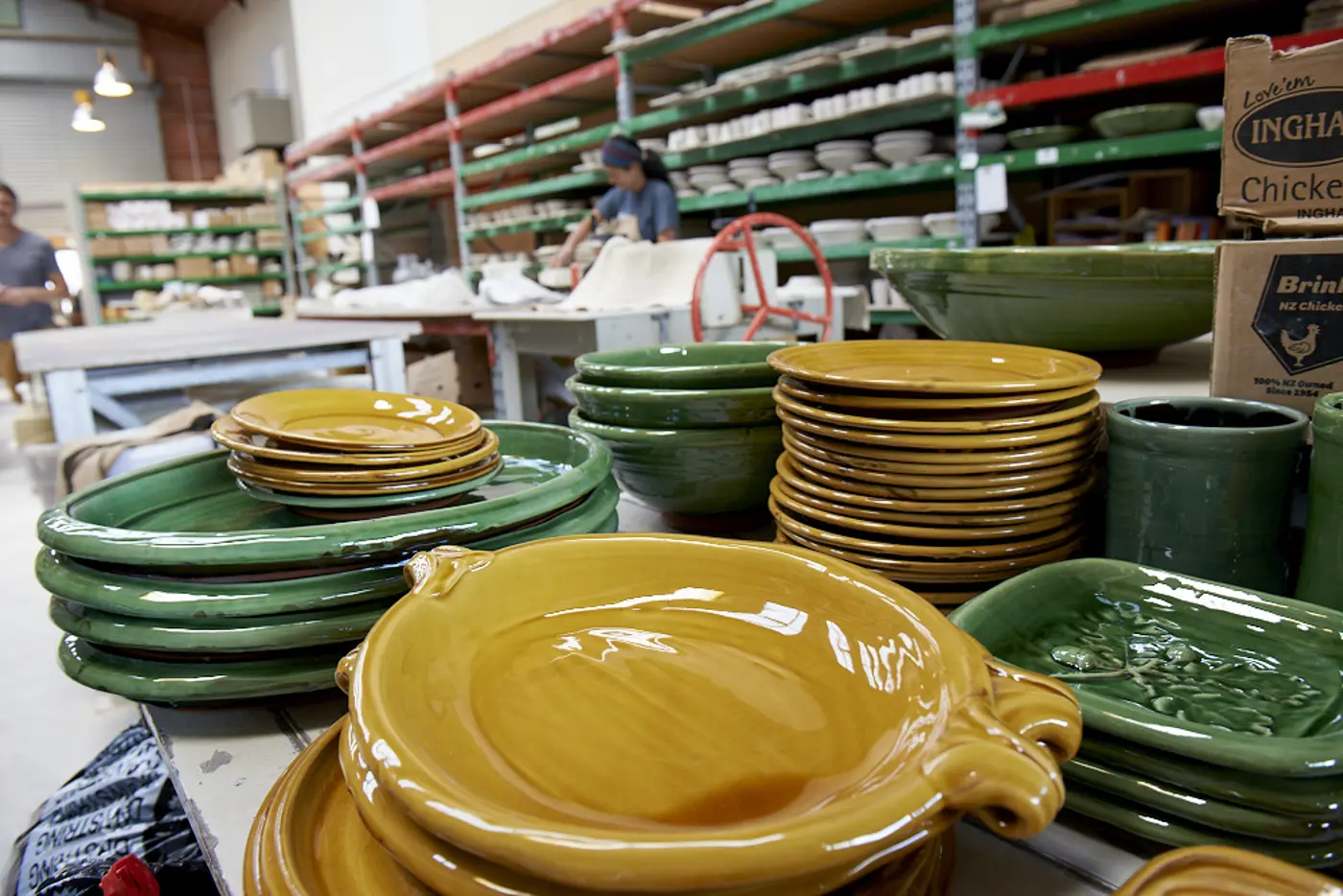 a stack of plates and bowls in a store