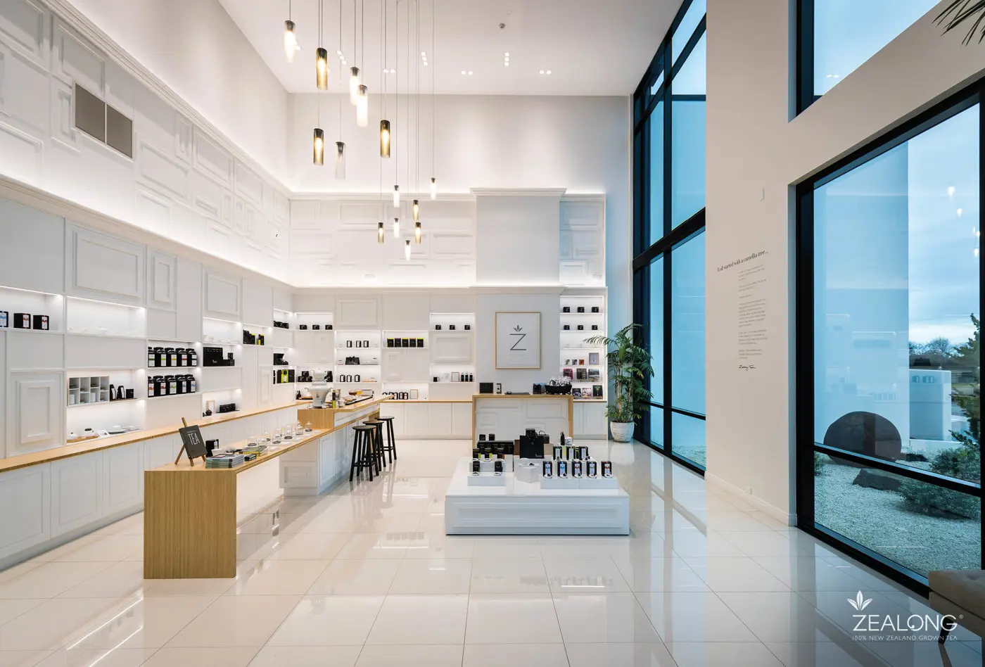 a room with white walls and shelves with bottles of perfume