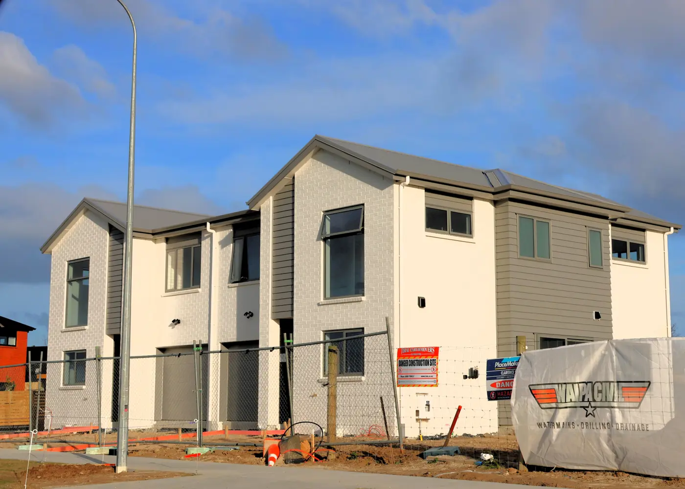 a row of houses under construction