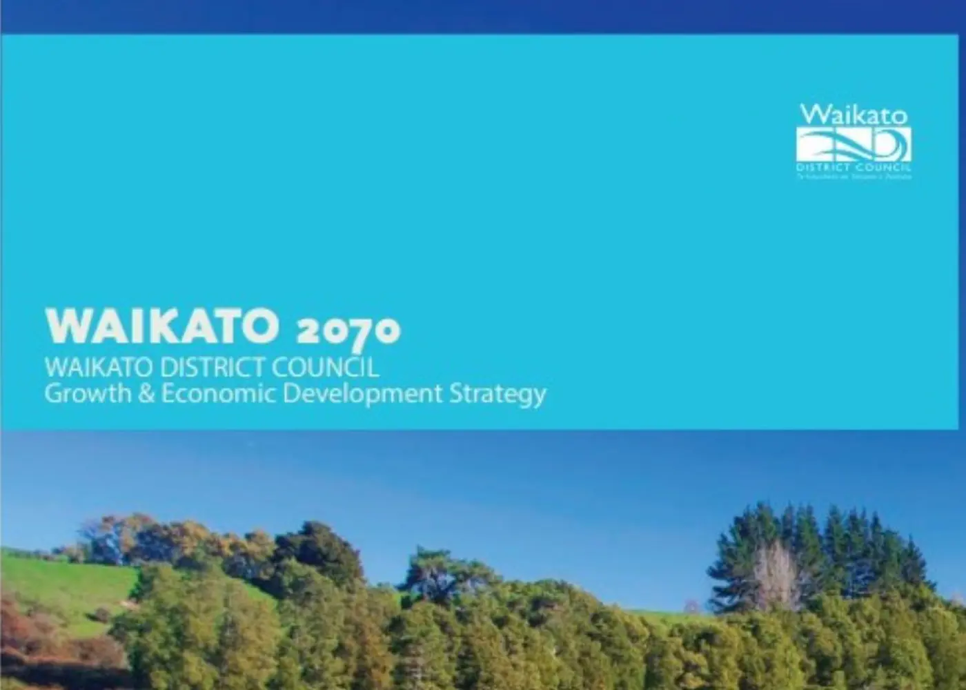 a blue rectangular banner with trees and text