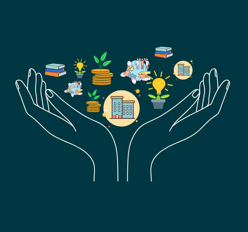 a hands holding a picture of a building and a plant