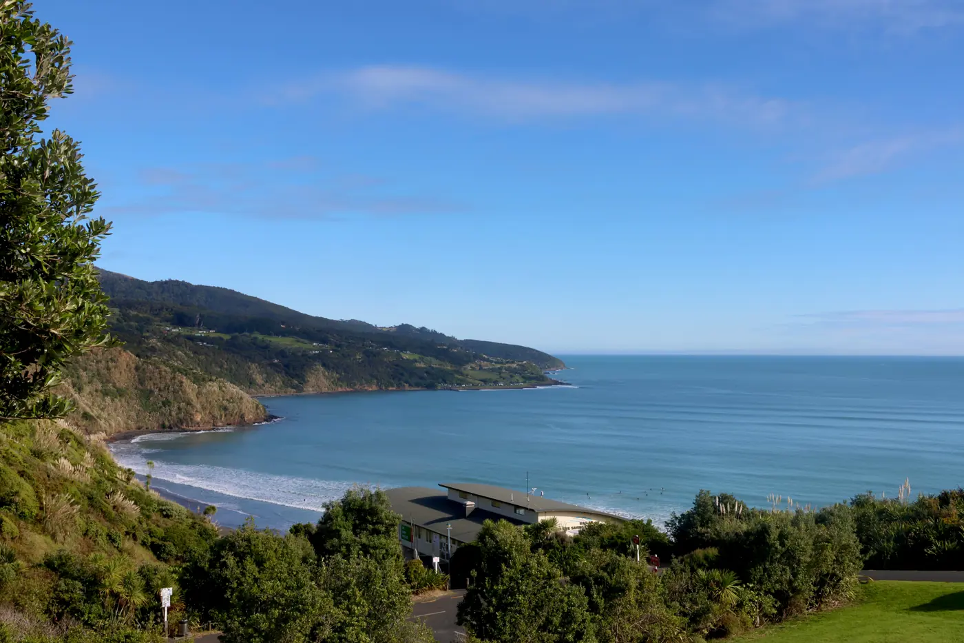a building next to a body of water