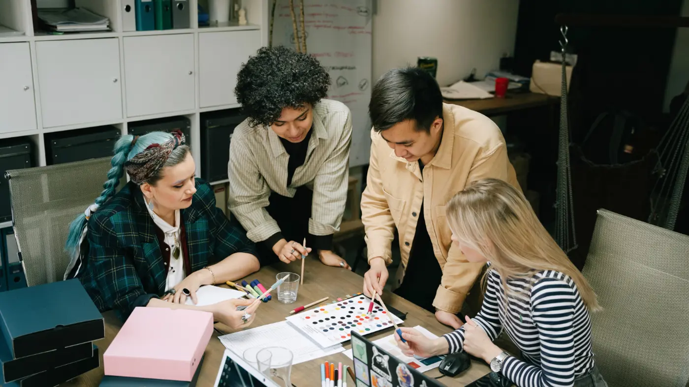 a group of people around a table