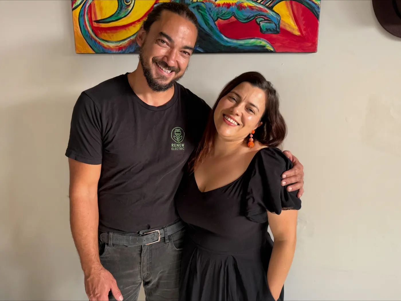 a man and woman posing for a picture