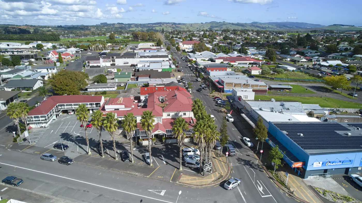a city with cars and buildings
