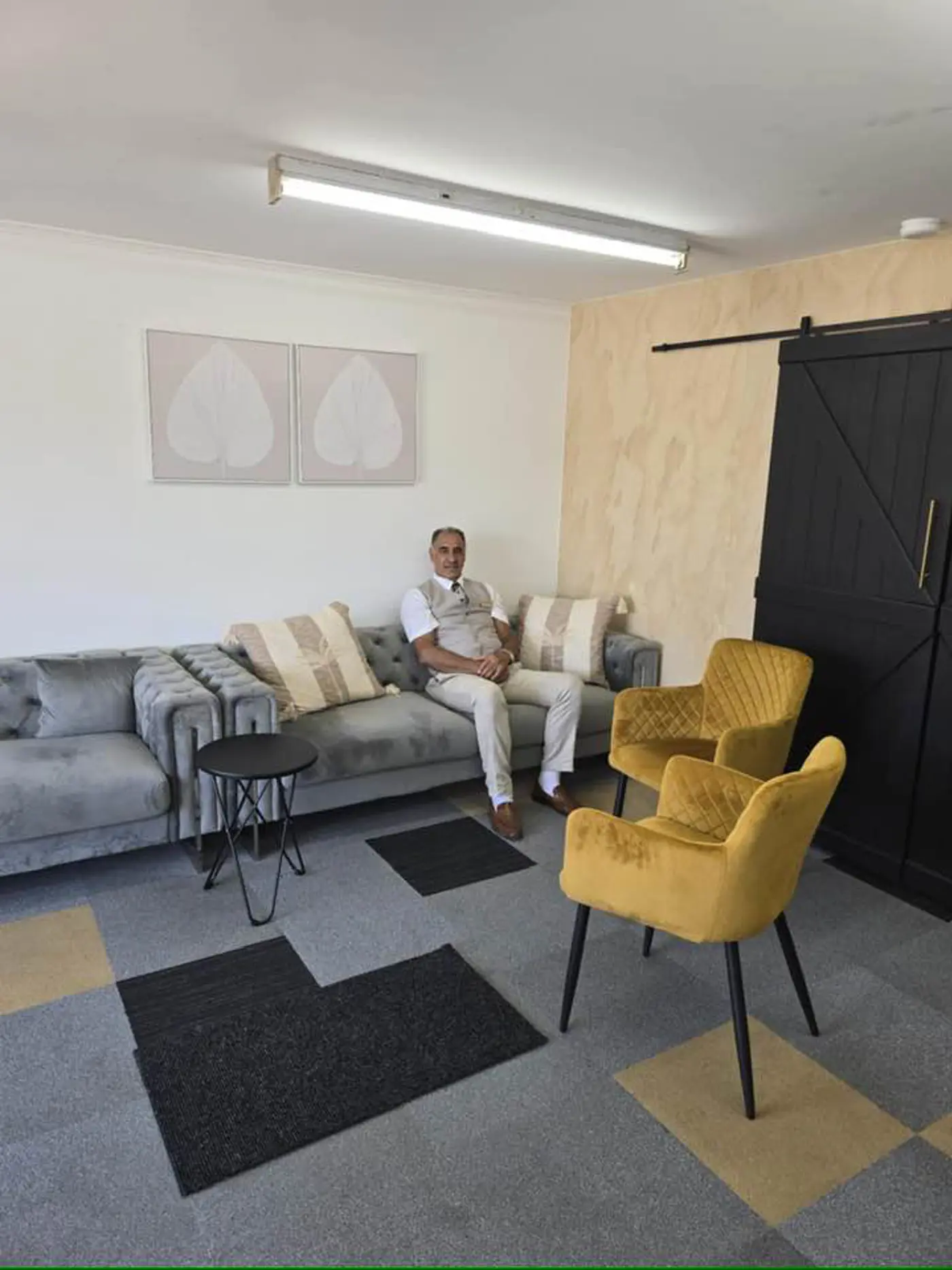 a man sitting on a couch